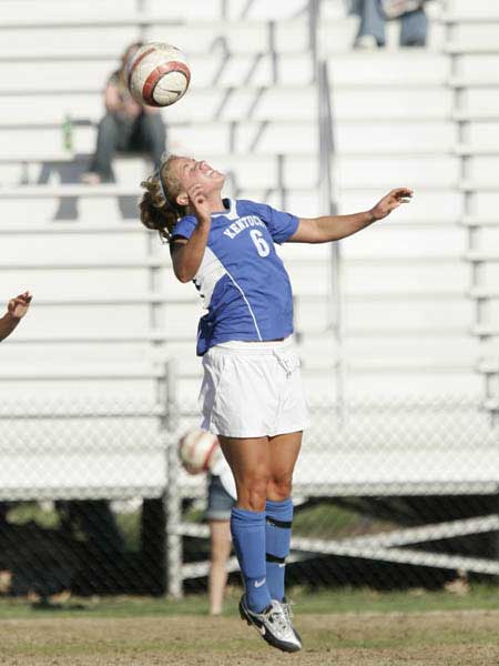 UK soccer player heads the ball