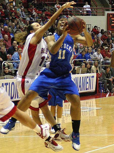 UK womens b-ball player hangs in the air